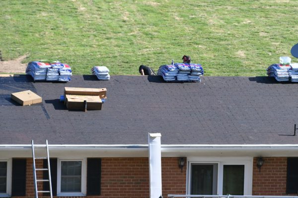 roofers-roofing-company-repairing-a-damaged-roof-w-2026-01-08-22-22-02-utc (Large)